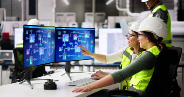 Engineer Operators Using Scada System At Industrial Plant
